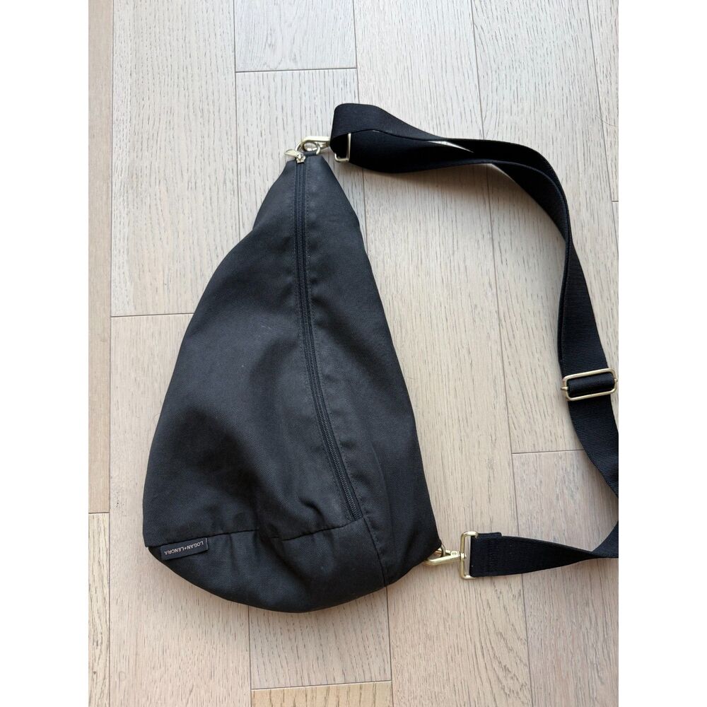 Logan + Lenora Black Sling Crossbody Bag Waterproof Lining Multi Pocket Unisex